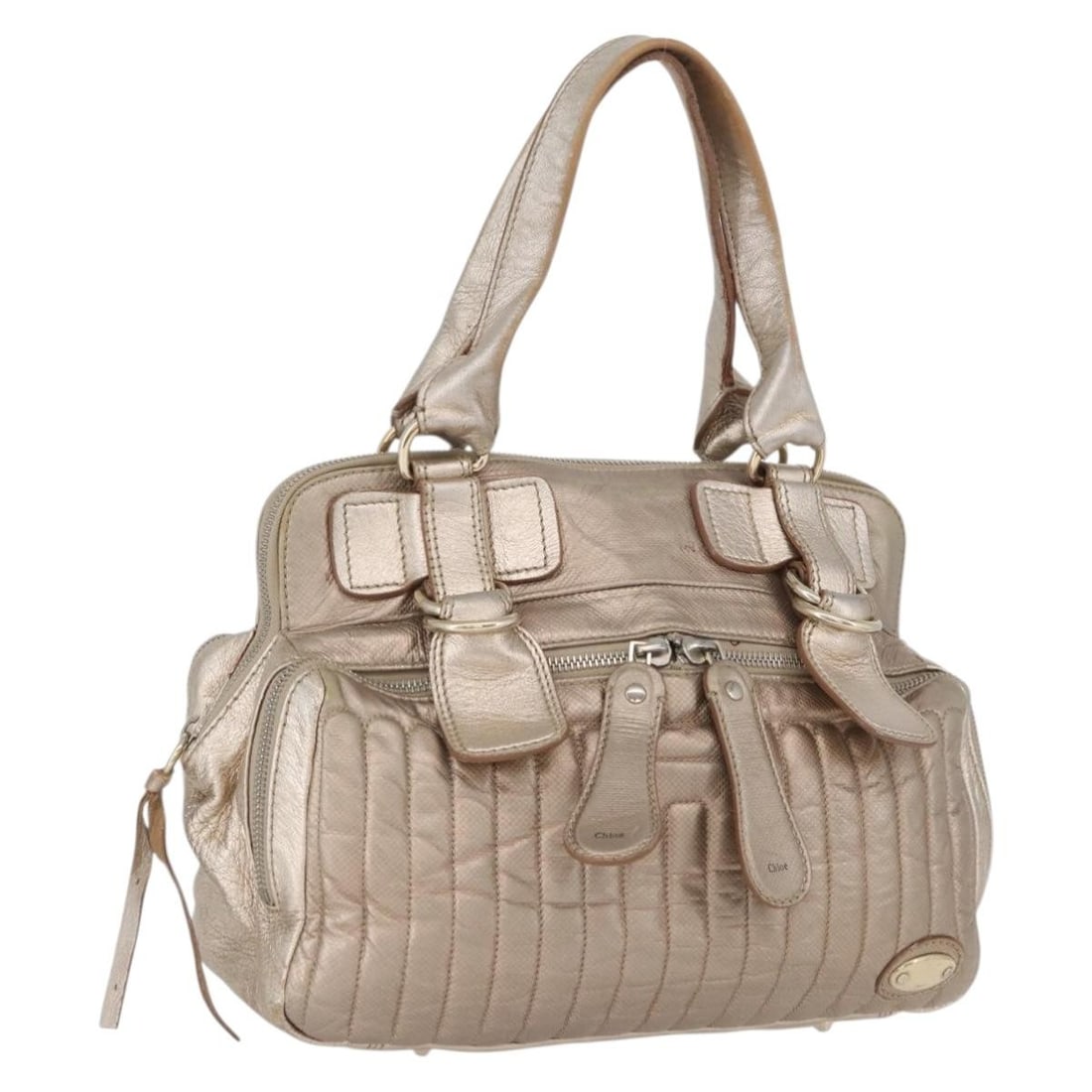 Chloe beige gold leather handbag Italy 11.8 inch: Chloe beige gold leather handbag Italy 11.8 inch This Chloe handbag is crafted from beige and gold leather, offering a stylish and functional accessory for women. Made in Italy, the bag features a spa