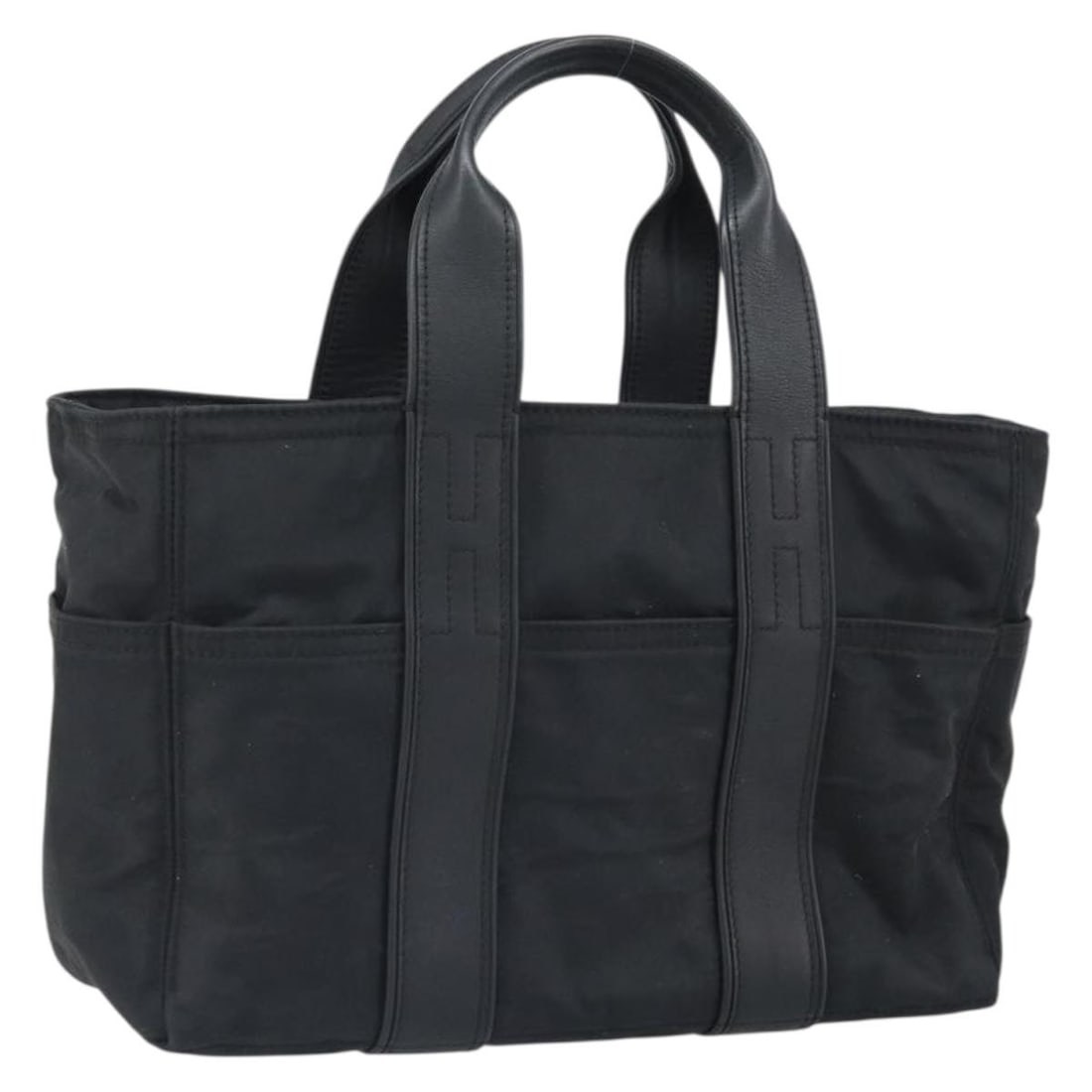 Black Nylon Hand Bag HERMES Acape Luco PM France: Black Nylon Hand Bag HERMES Acape Luco PM France Hermes Acape Luco PM hand bag in black nylon, made in France. Designed for women, this bag measures approximately 30 cm wide, 20 cm high, and 15 cm dee