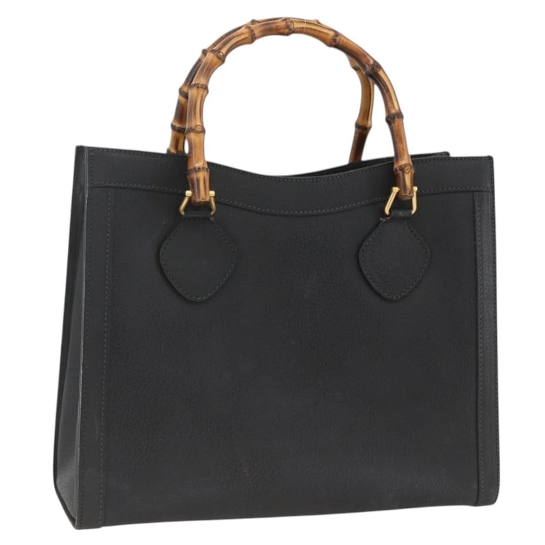 Gucci Bamboo black gold leather handbag Italy 002 853 0260: Gucci Bamboo black gold leather handbag Italy 002 853 0260 This GUCCI Bamboo Hand Bag features black leather with gold accents and is crafted in Italy. The bag measures approximately 13.8 inches in le