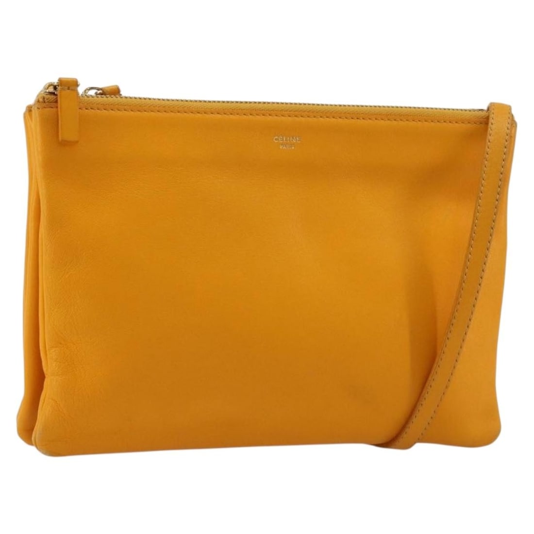 Celine Trio Leather Shoulder Bag Yellow Gold with Dust Bag: Celine Trio Leather Shoulder Bag Yellow Gold with Dust Bag A CELINE Trio shoulder bag in yellow/gold leather, made in Italy. It comes with a dust bag and features a shoulder drop of approximately 45-5