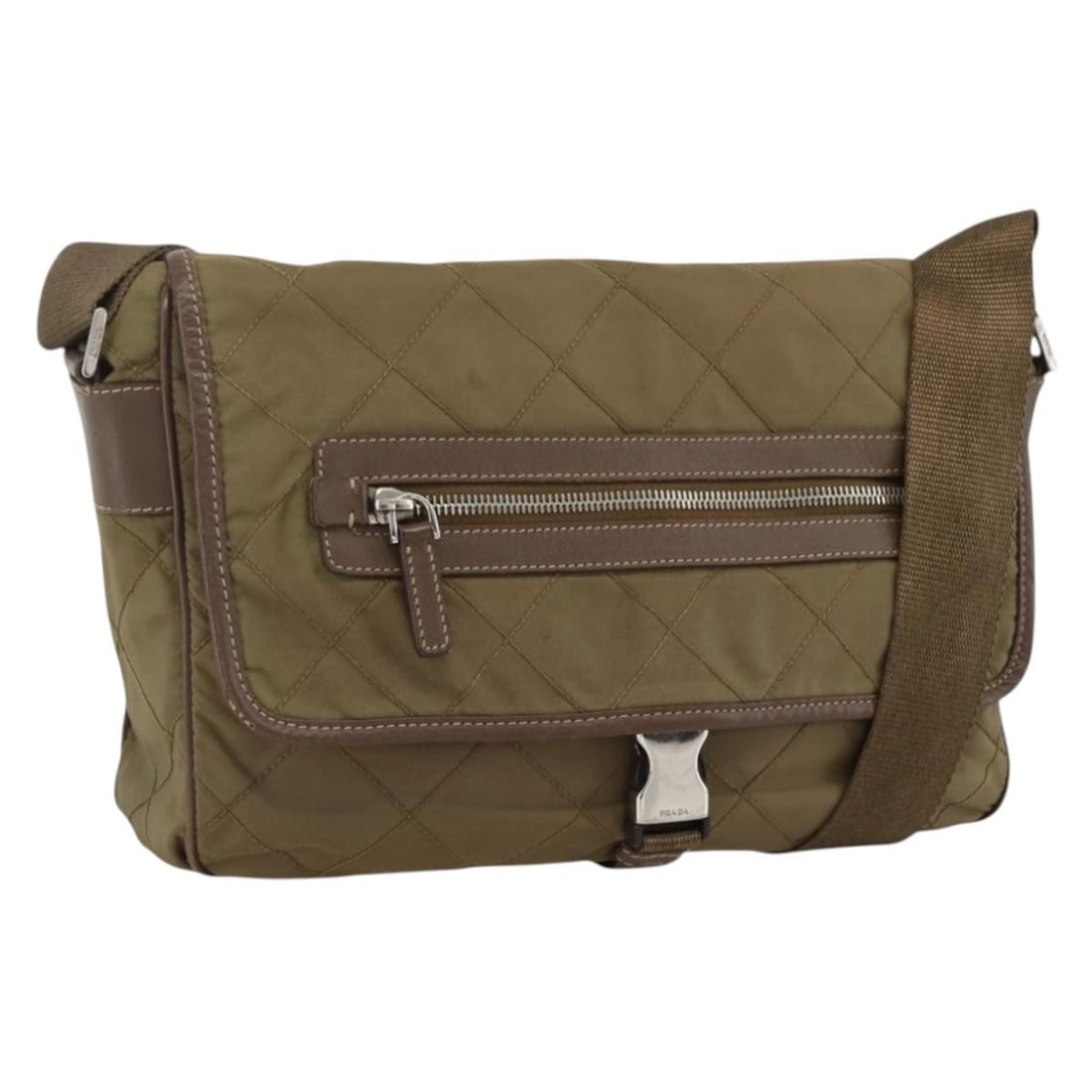 Brown Nylon Shoulder Purse by PRADA with Silver Accents: Brown Nylon Shoulder Purse by PRADA with Silver Accents This PRADA shoulder bag is crafted from brown nylon with silver-tone accents, designed for women. The bag features an adjustable shoulder strap 