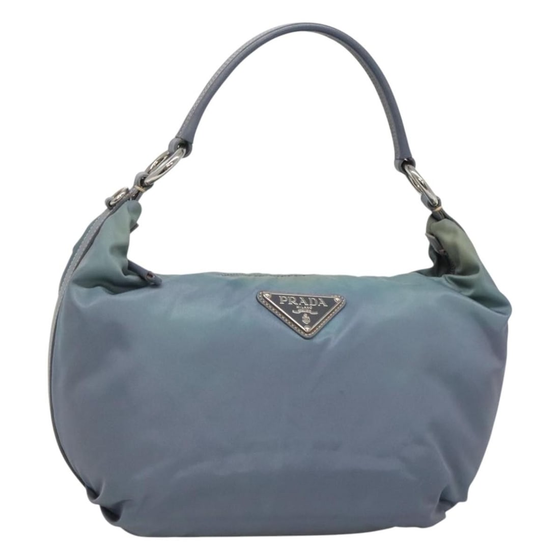 PRADA Blue Nylon Shoulder Bag with Guarantee Card: PRADA Blue Nylon Shoulder Bag with Guarantee Card Authentic Prada shoulder bag in blue nylon with silver-tone accents, made in Italy. This women's bag includes the guarantee card. Condition is heavily