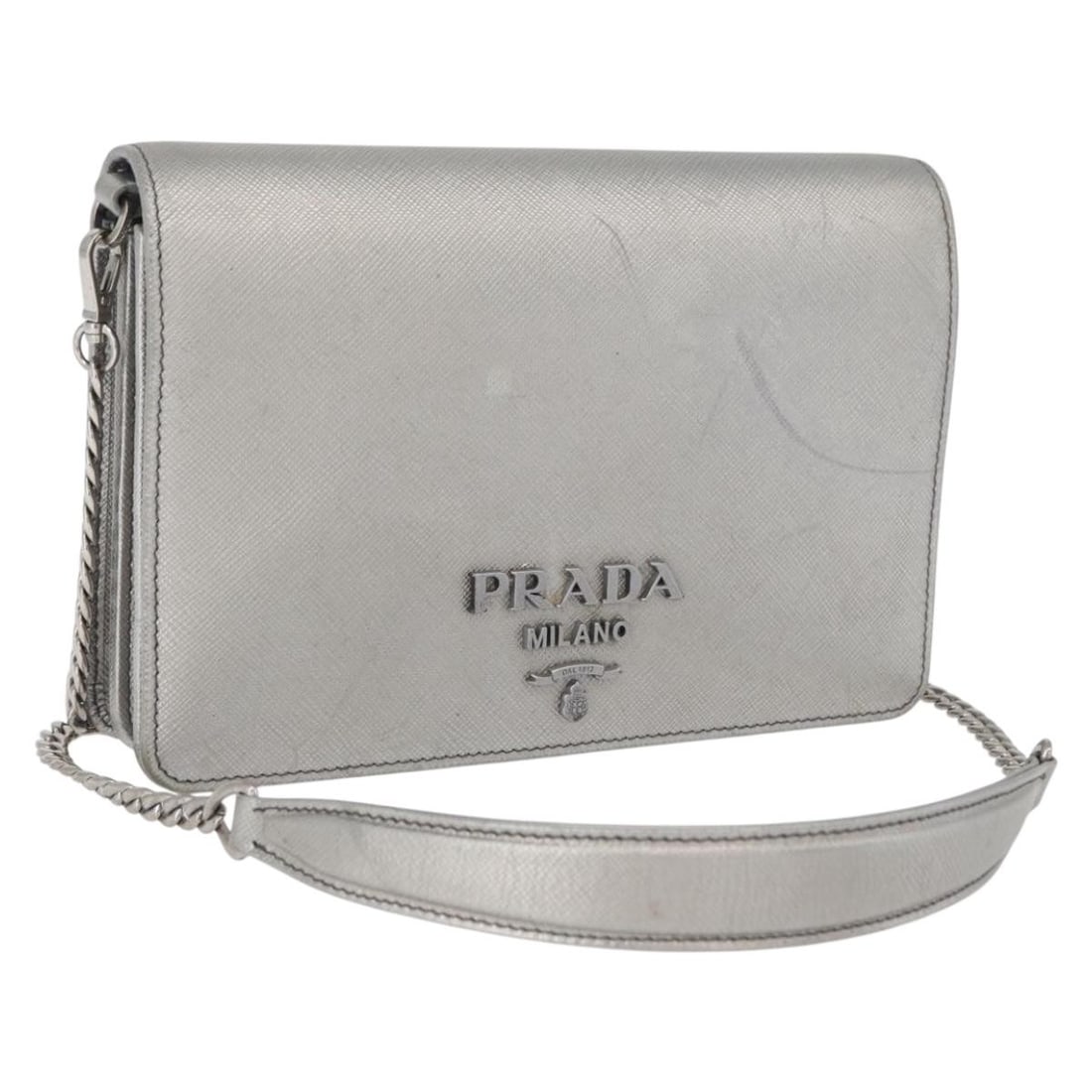 Prada Saffiano Leather Shoulder Bag Silver Chain Strap Italy: Prada Saffiano Leather Shoulder Bag Silver Chain Strap Italy This PRADA chain shoulder bag is crafted from Saffiano leather in a silver color and made in Italy. It features a shoulder bag style with a