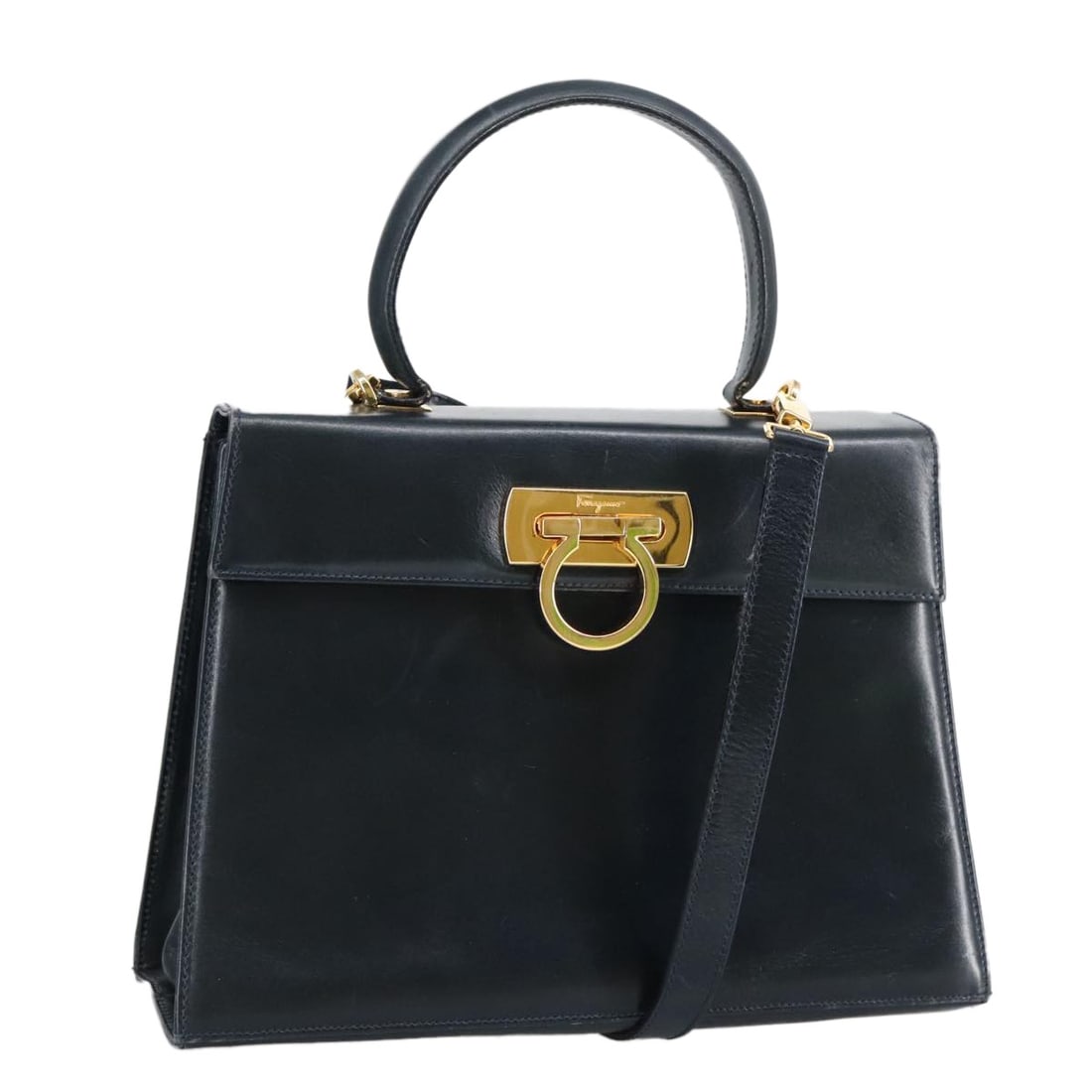 Salvatore Ferragamo Gancini Navy Leather Convertible Shoulder Handbag: Salvatore Ferragamo Gancini Navy Leather Convertible Shoulder Handbag This Salvatore Ferragamo Gancini handbag is crafted from navy leather and offers versatile 2-way carrying with both top handles an