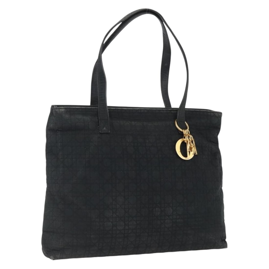 Christian Dior nylon tote bag black with gold tone charm: Christian Dior nylon tote bag black with gold tone charm Christian Dior Cannage tote bag in black nylon with gold-tone accents. Made in Spain, this women's tote includes a charm accessory. Condition i