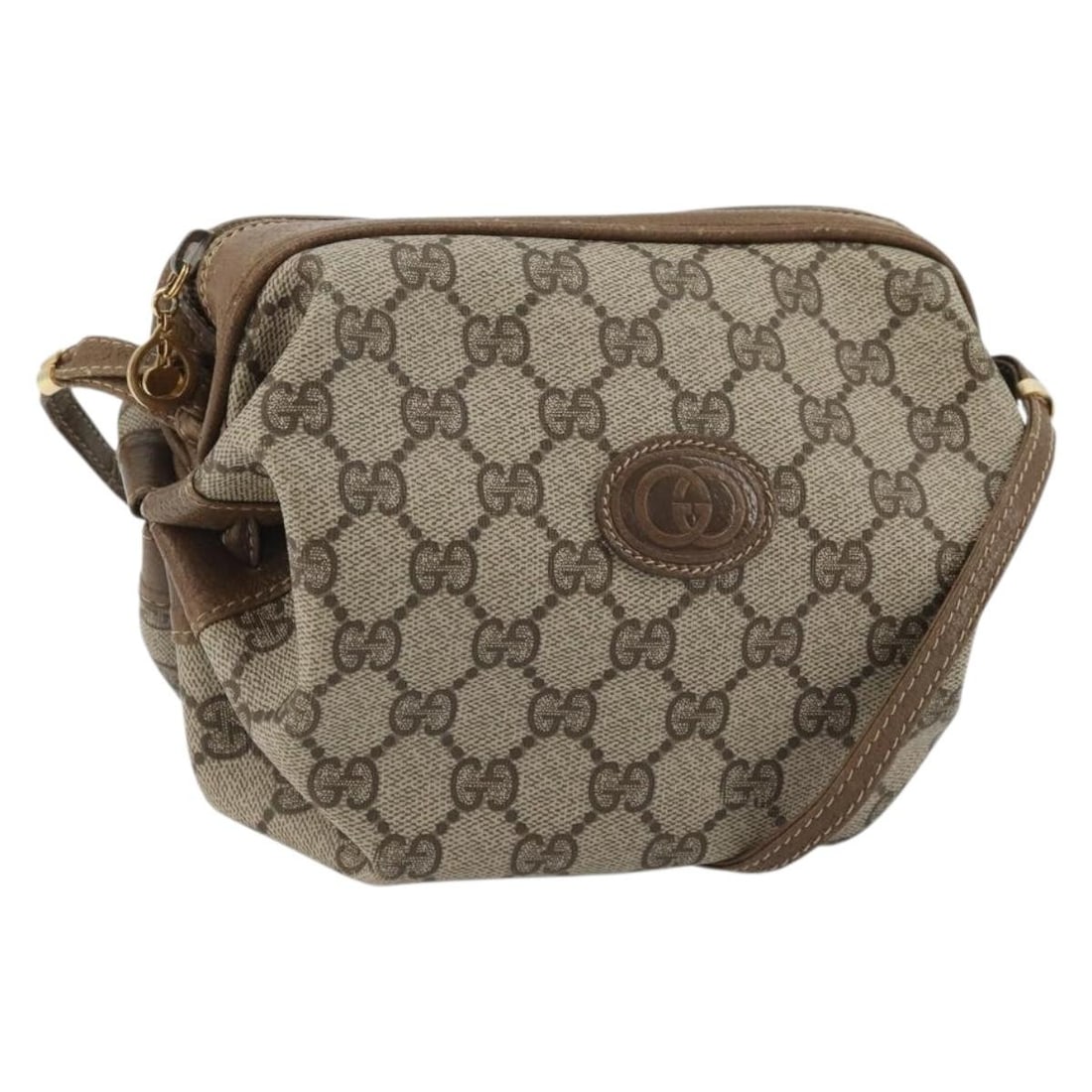 Gucci Beige Gold GG Canvas Shoulder Bag Italy 007 37 5770: Gucci Beige Gold GG Canvas Shoulder Bag Italy 007 37 5770 This Gucci GG Supreme shoulder bag features a beige and gold PVC leather and GG canvas exterior. Designed for women, it offers a compact and s