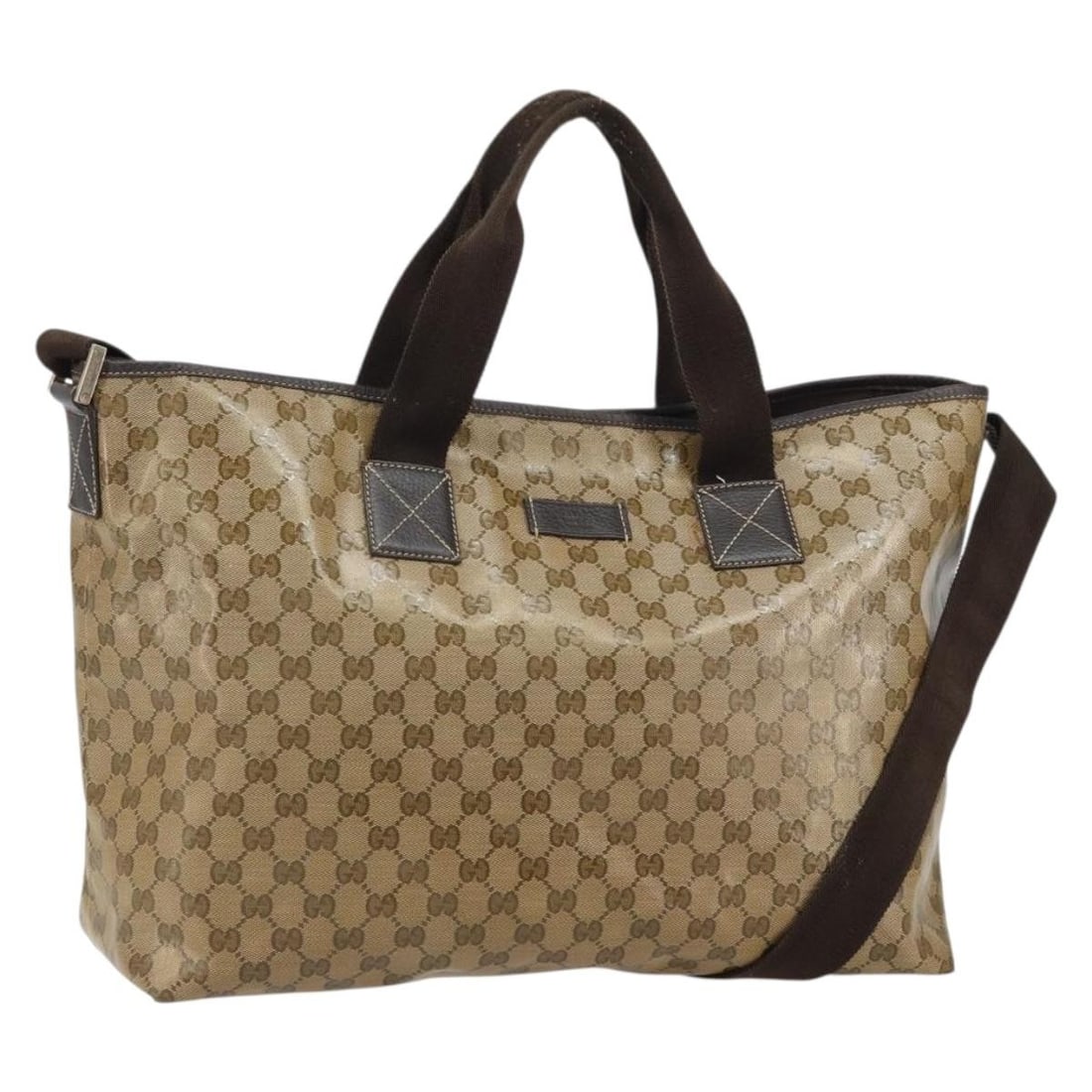 Gucci GG Crystal Brown Coated Canvas Tote 257298: Gucci GG Crystal Brown Coated Canvas Tote 257298 This GUCCI GG Crystal tote bag is crafted from brown coated canvas, featuring the iconic GG pattern. Designed for women, it offers a spacious interior 