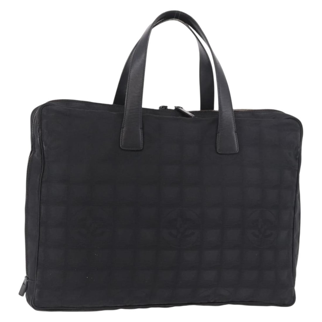 Chanel New Travel Line Black Nylon Handbag Italy: Chanel New Travel Line Black Nylon Handbag Italy A Chanel New Travel Line hand bag in black nylon, made in Italy. This pre-owned bag features a structured silhouette with a handle drop of approximatel