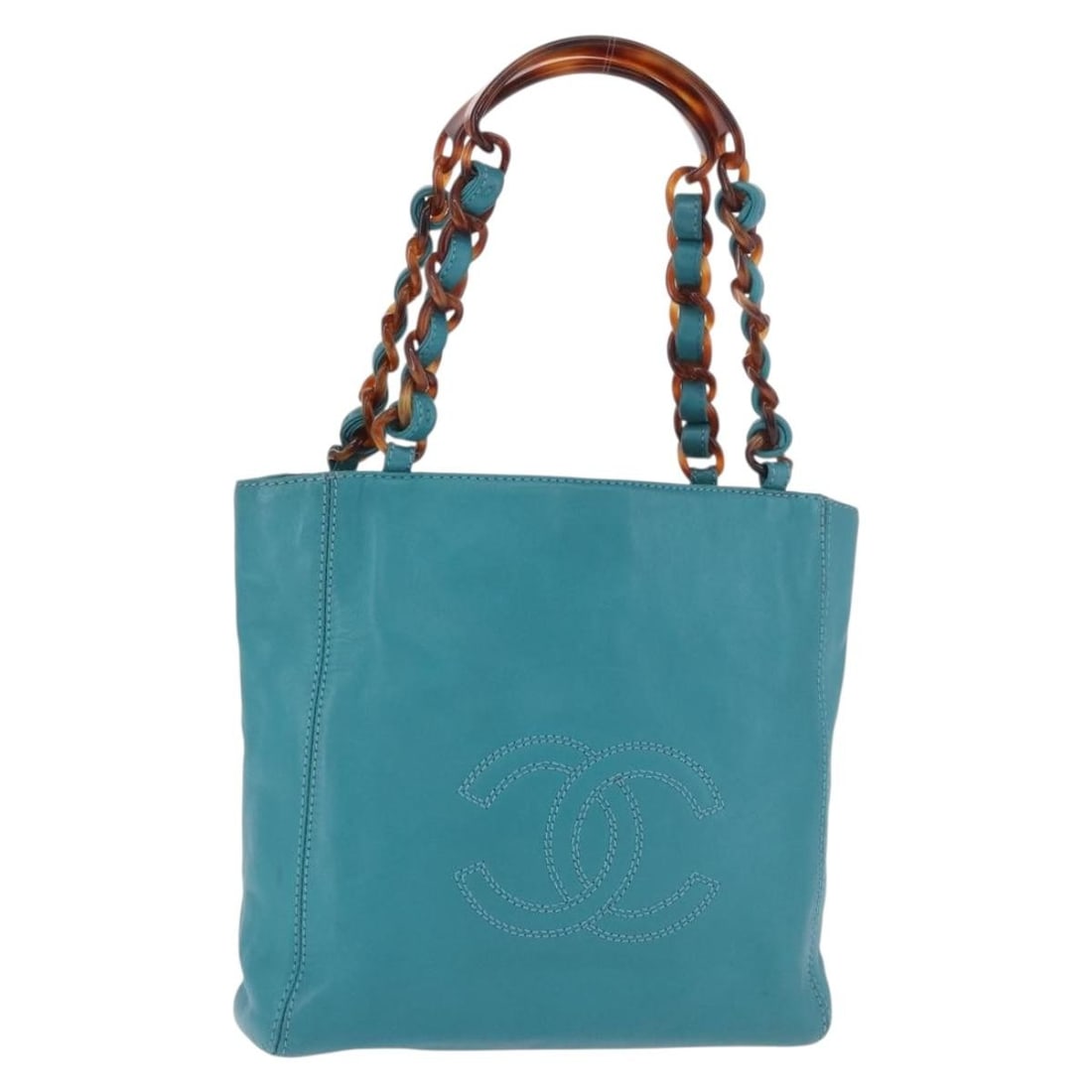 CHANEL CC Lamb Skin Chain Tote Turquoise Blue Tortoise Pattern: CHANEL CC Lamb Skin Chain Tote Turquoise Blue Tortoise Pattern This CHANEL tote bag features a tortoise pattern chain design in turquoise blue lamb skin. It is made in Italy and offers a compact silho