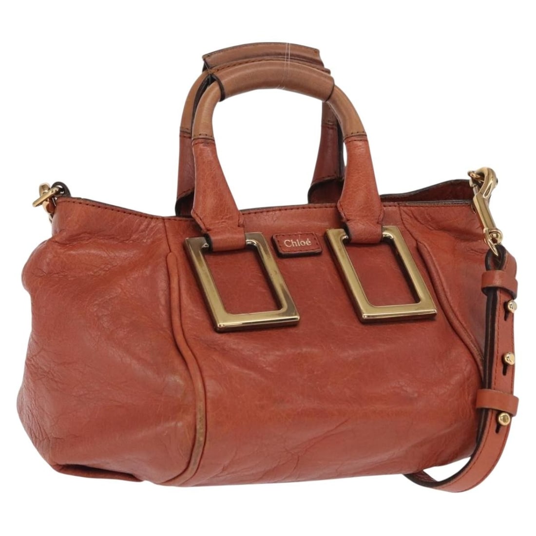 Chloe Etel Brown Leather Handbag with Gold Tone and Shoulder Strap: Chloe Etel Brown Leather Handbag with Gold Tone and Shoulder Strap This Chloe Etel handbag features brown leather with gold-tone hardware, designed for versatile two-way use with both a shoulder strap