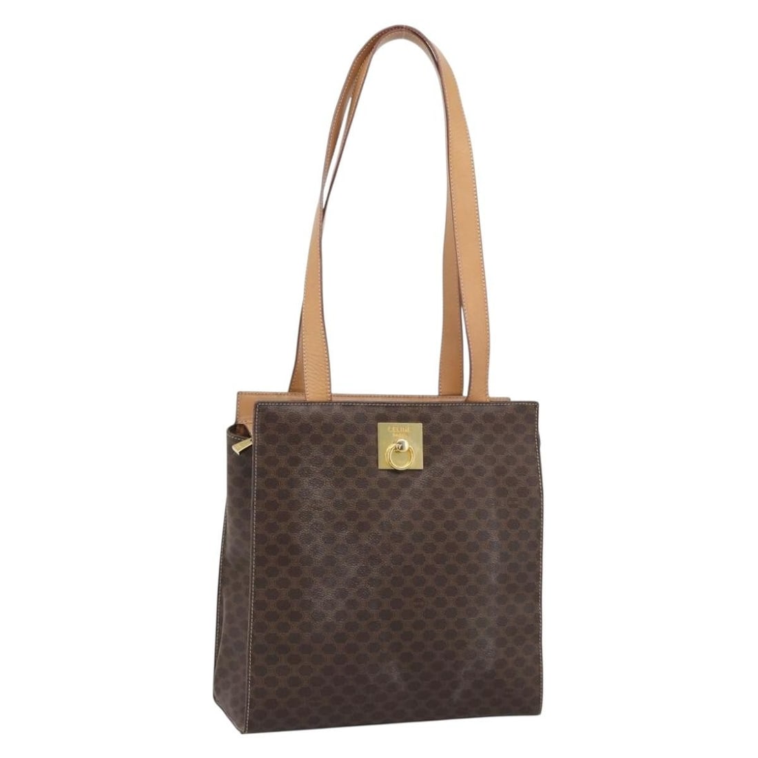 Celine Macadam Canvas Tote in Brown PVC Leather Gold Tone: Celine Macadam Canvas Tote in Brown PVC Leather Gold Tone A brown and gold tone CELINE tote bag in PVC leather and Macadam canvas. Made in Italy, it features a structured tote style with a handle drop