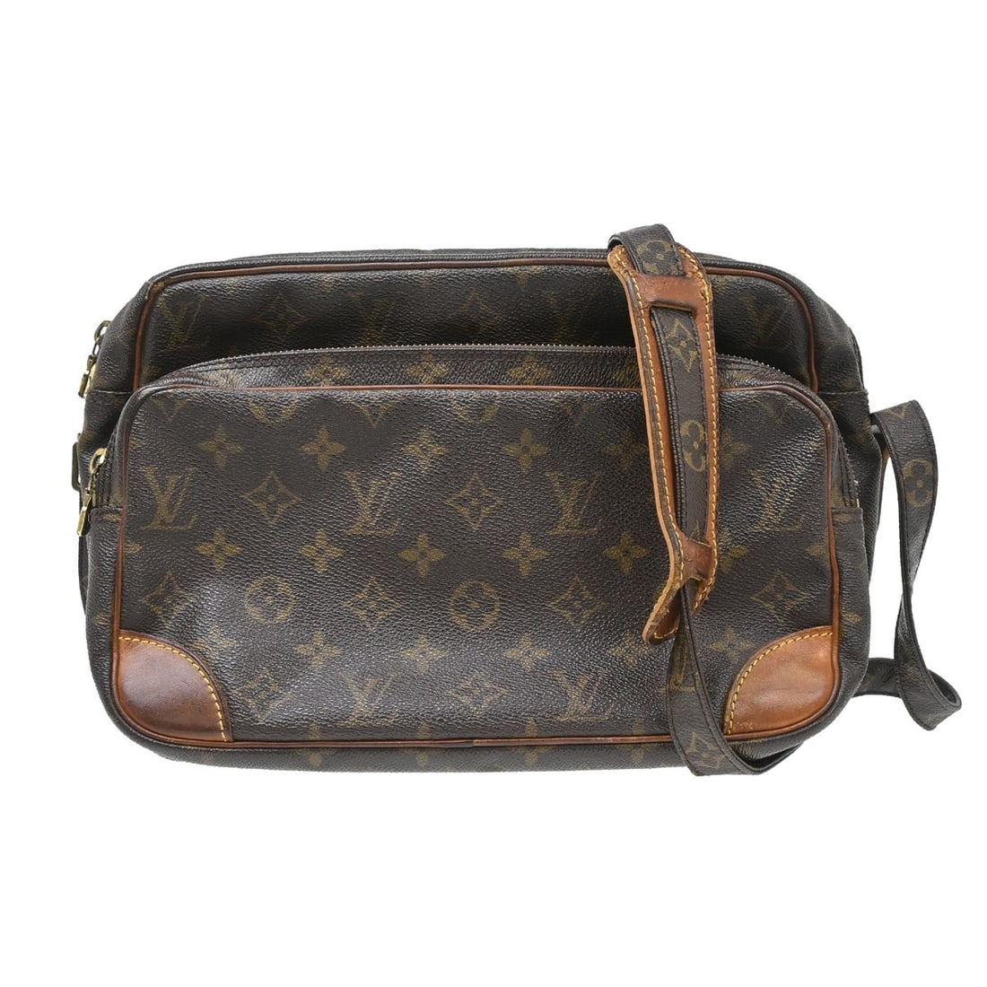 Louis Vuitton Nile Monogram Canvas Crossbody Bag M45244: Louis Vuitton Nile Monogram Canvas Crossbody Bag M45244 Vintage Louis Vuitton Nile crossbody shoulder bag in brown Monogram canvas with leather trim. This medium unisex bag features a buckle closure, 