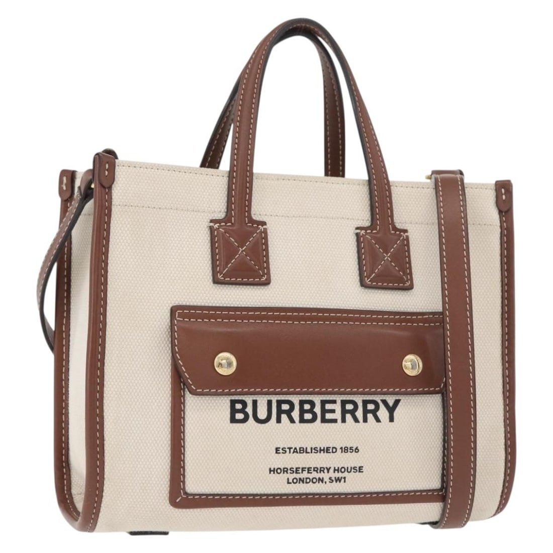Burberry Beige Gold Canvas 2way Handbag with Shoulder Strap: Burberry Beige Gold Canvas 2way Handbag with Shoulder Strap A Burberry 2-way handbag in beige and gold canvas, made in Italy. It comes with a shoulder strap and features a compact handbag style. Condi