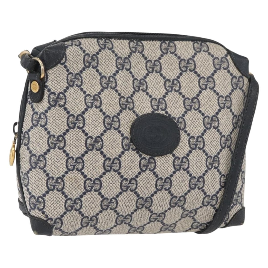 Gucci GG Supreme Navy PVC Leather Shoulder Bag Gold Accents 007 58 0093: Gucci GG Supreme Navy PVC Leather Shoulder Bag Gold Accents 007 58 0093 This Gucci GG Supreme shoulder bag features a classic navy and gold color scheme with a PVC leather and GG canvas exterior. Desi