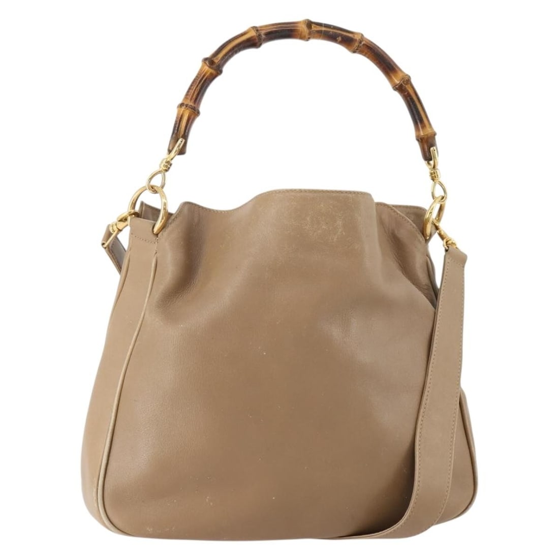 Gucci Bamboo leather shoulder bag beige gold Italy 001 2113 1638: Gucci Bamboo leather shoulder bag beige gold Italy 001 2113 1638 This GUCCI Bamboo Shoulder Bag is crafted from beige and gold leather and features the iconic bamboo detail. Designed for women, it off