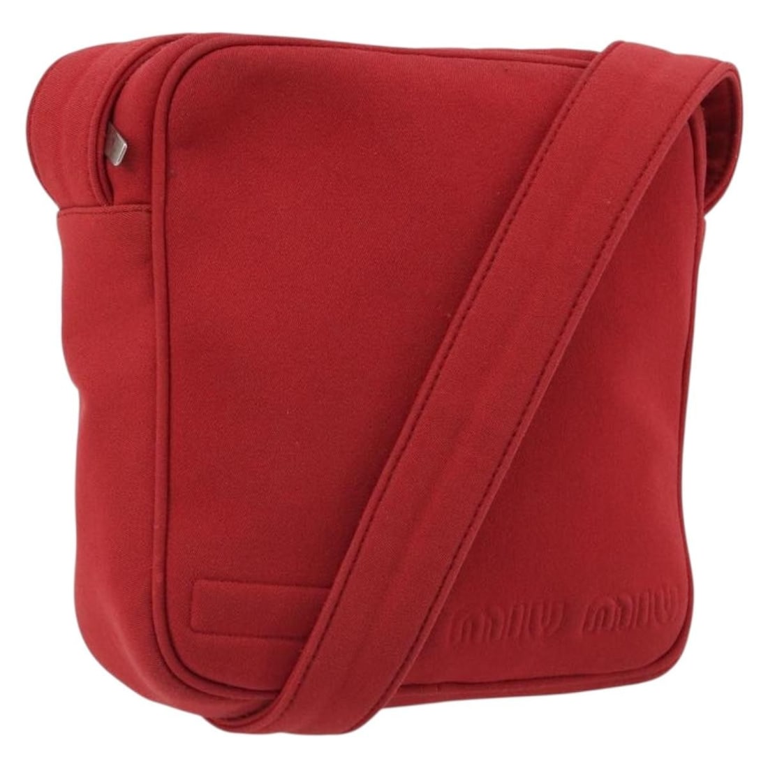 Miu Miu Red Canvas Shoulder Bag Made in Italy: Miu Miu Red Canvas Shoulder Bag Made in Italy Authentic Miu Miu shoulder bag in red canvas with a compact silhouette and shoulder strap. This women's bag was made in Italy and is offered without the o