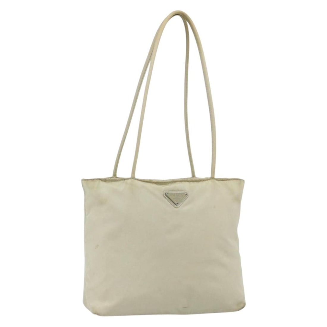 Prada Nylon Beige Silver Tote Bag with Guarantee Card: Prada Nylon Beige Silver Tote Bag with Guarantee Card This PRADA tote bag is crafted from beige nylon with silver accents, offering a practical and stylish option for everyday use. Made in Italy, it f