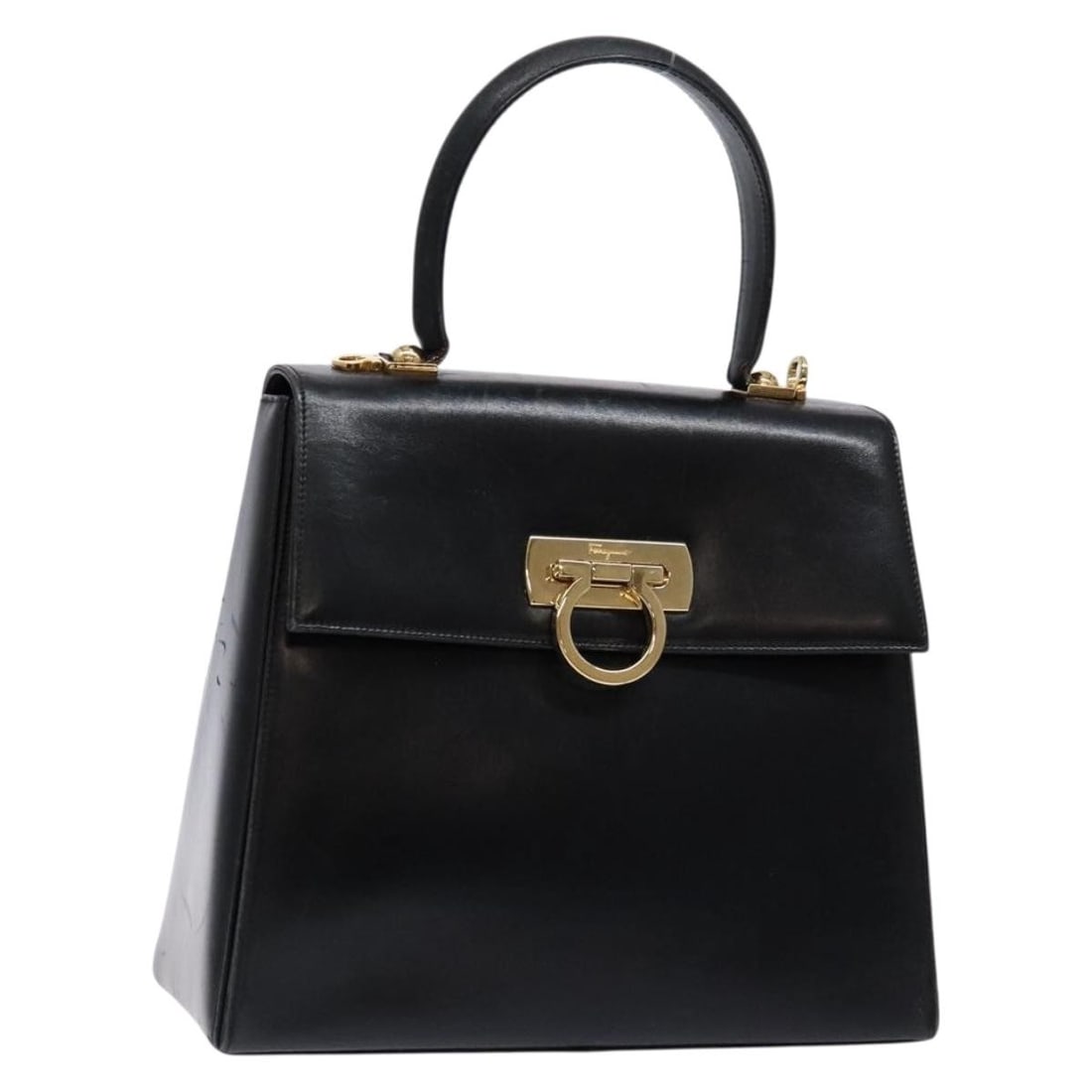 Black Leather Hand Bag Salvatore Ferragamo Gancini Gold Tone: Black Leather Hand Bag Salvatore Ferragamo Gancini Gold Tone Black and gold leather handbag made in Italy. The bag has a structured size of approximately 27 cm wide, 22 cm high, and 10 cm deep, with a