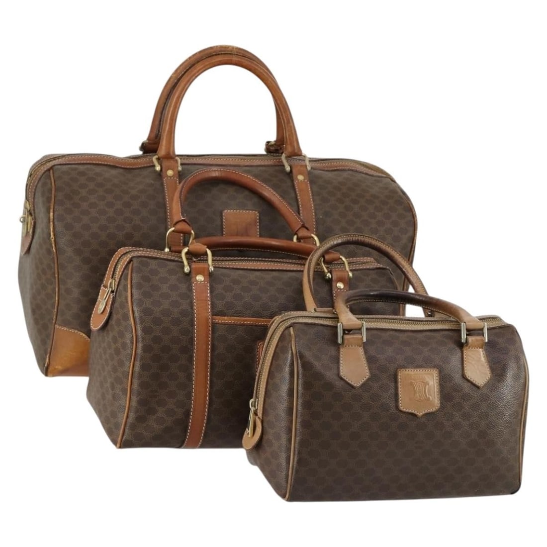 Set of 3 Celine Macadam Brown PVC Handbags from Italy: Set of 3 Celine Macadam Brown PVC Handbags from Italy This is a set of three authentic CELINE Macadam canvas handbags crafted in brown PVC leather and Macadam canvas. Made in Italy, these bags feature