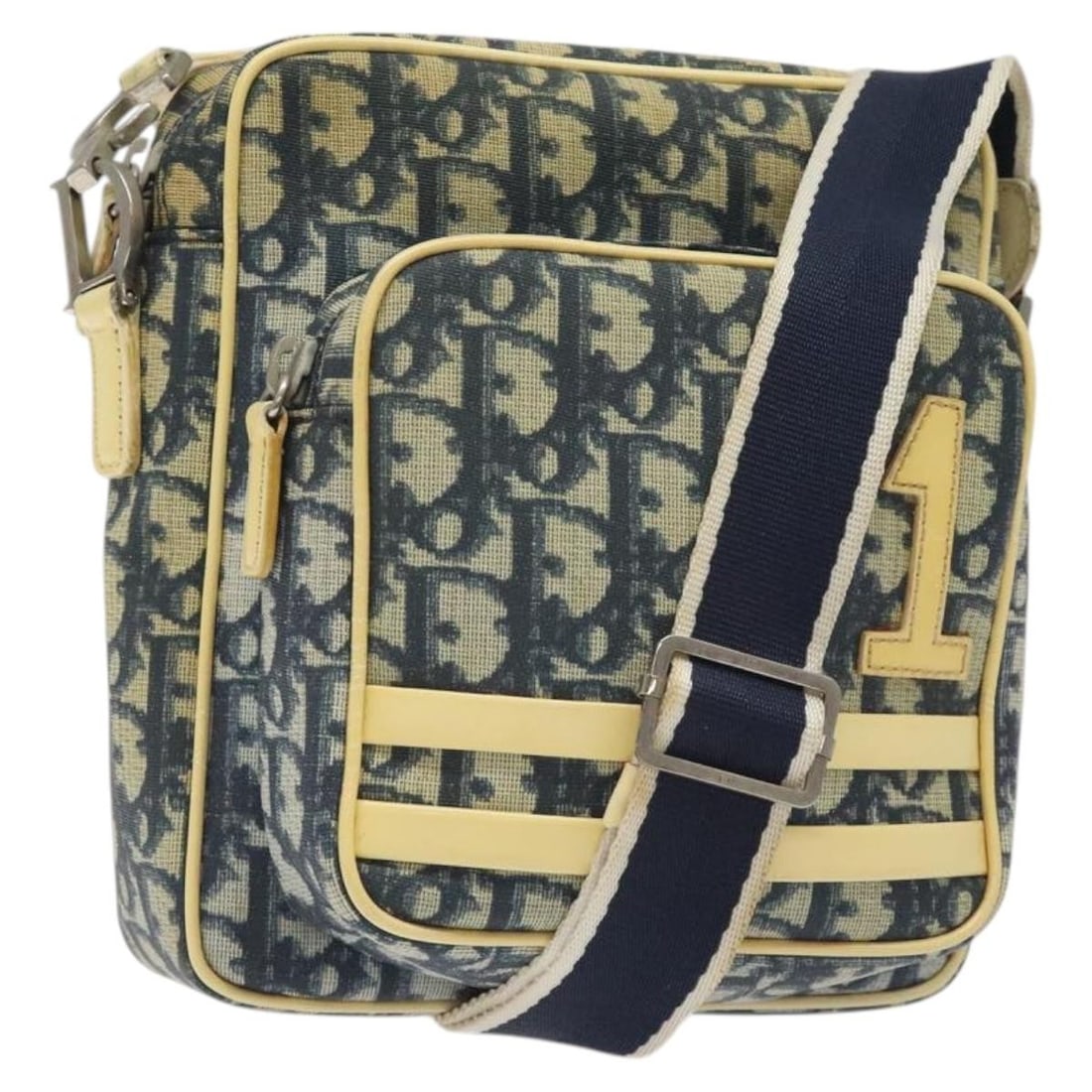 Christian Dior Navy Trotter Canvas Shoulder Bag Gold Tone: Christian Dior Navy Trotter Canvas Shoulder Bag Gold Tone Christian Dior shoulder bag in navy and gold Trotter canvas, made in France. This women's bag includes an adjustable shoulder strap and is off