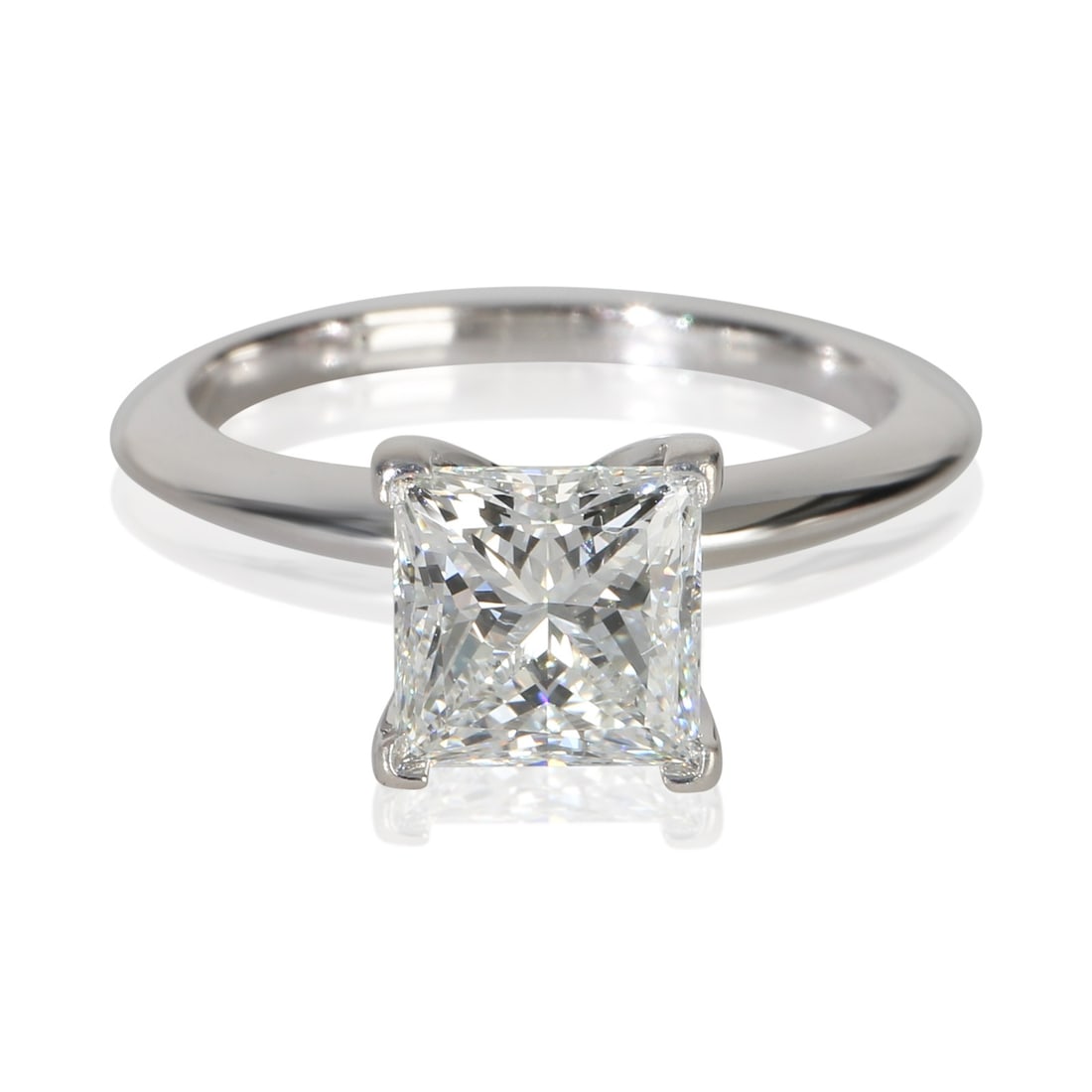 Tiffany & Co Princess Diamond Platinum Engagement Ring 1.56 ct Size 5.5: Tiffany & Co Princess Diamond Platinum Engagement Ring 1.56 ct Size 5.5 This pre-owned Tiffany & Co. engagement ring features a 1.56 carat princess-cut diamond set in platinum. The diamond boasts an F