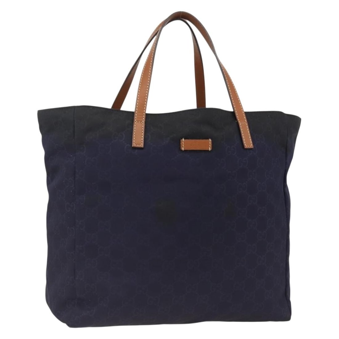 Navy Nylon GG Canvas Tote by Gucci Model 282439 Gold Accents: Navy Nylon GG Canvas Tote by Gucci Model 282439 Gold Accents This GUCCI GG Canvas tote bag features a navy and gold color scheme with nylon and GG canvas materials. Designed for women, the tote offers