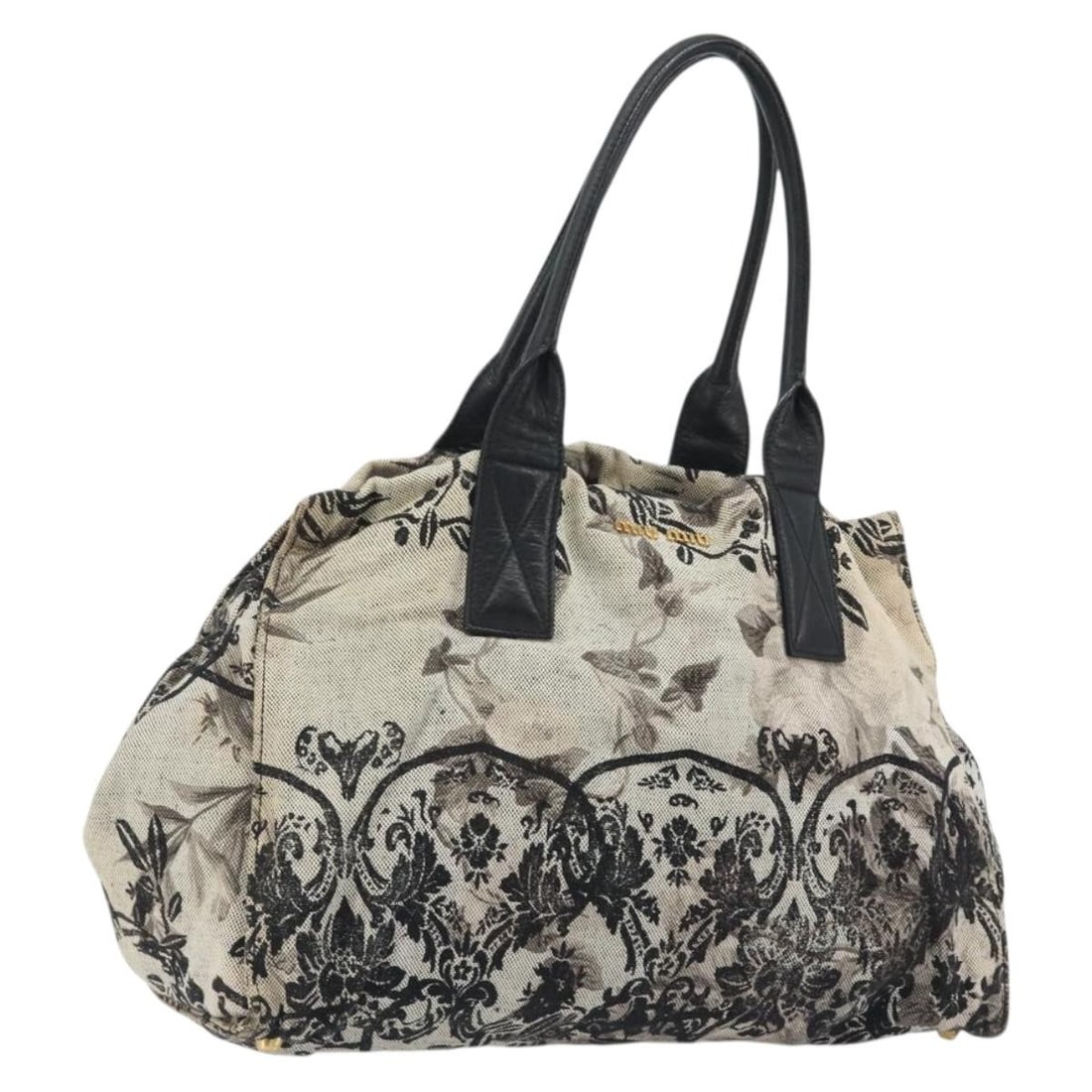 Miu Miu Beige Gold Canvas Tote Bag Made in Italy: Miu Miu Beige Gold Canvas Tote Bag Made in Italy Miu Miu tote bag in beige and gold canvas, made in Italy. This pre-owned bag features a structured tote style with a handle drop of approximately 20 cm