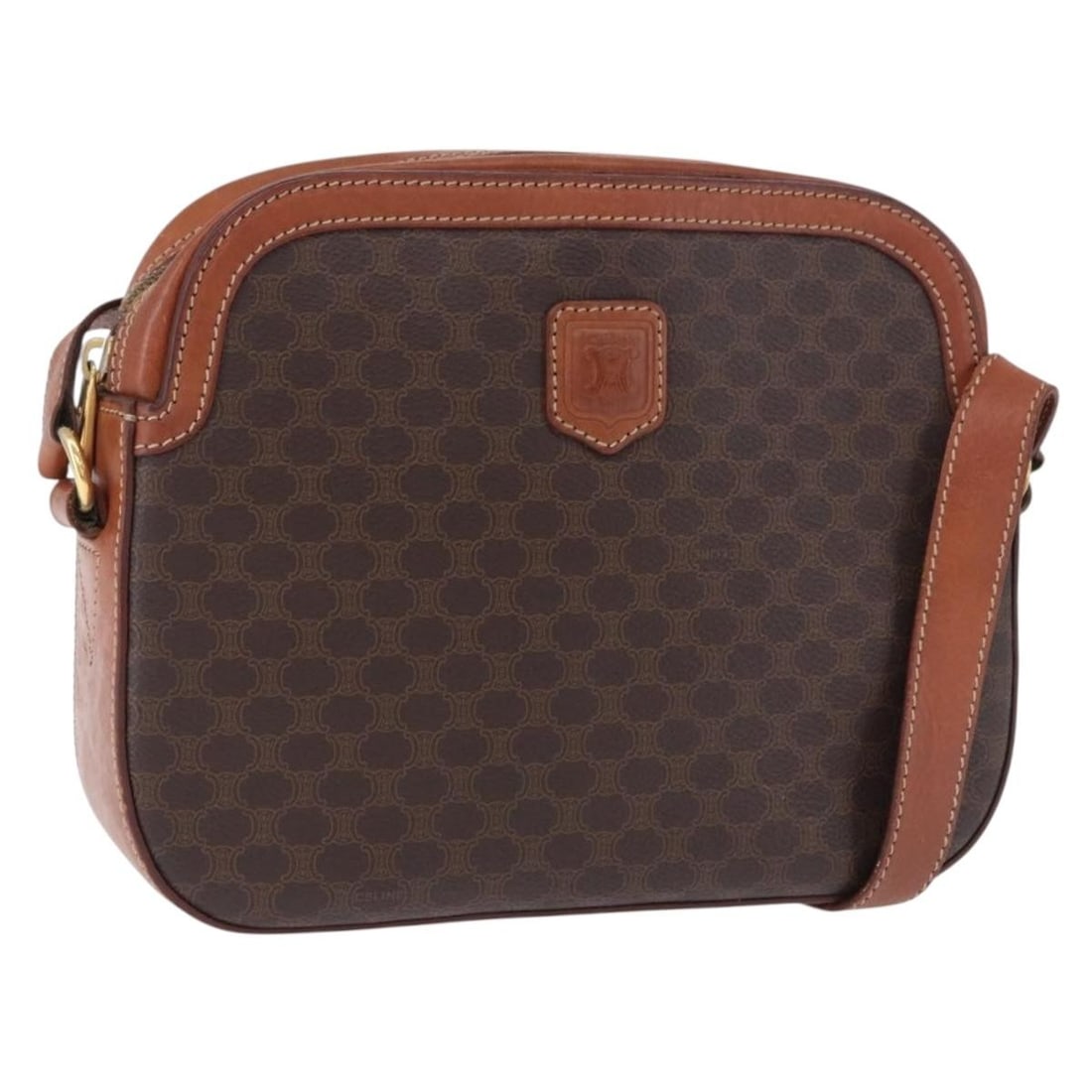 Celine Macadam PVC Leather Shoulder Bag Brown Gold Tone: Celine Macadam PVC Leather Shoulder Bag Brown Gold Tone A CELINE shoulder bag in brown and gold, crafted from PVC leather and Macadam canvas. It features a shoulder bag style with a shoulder drop of a