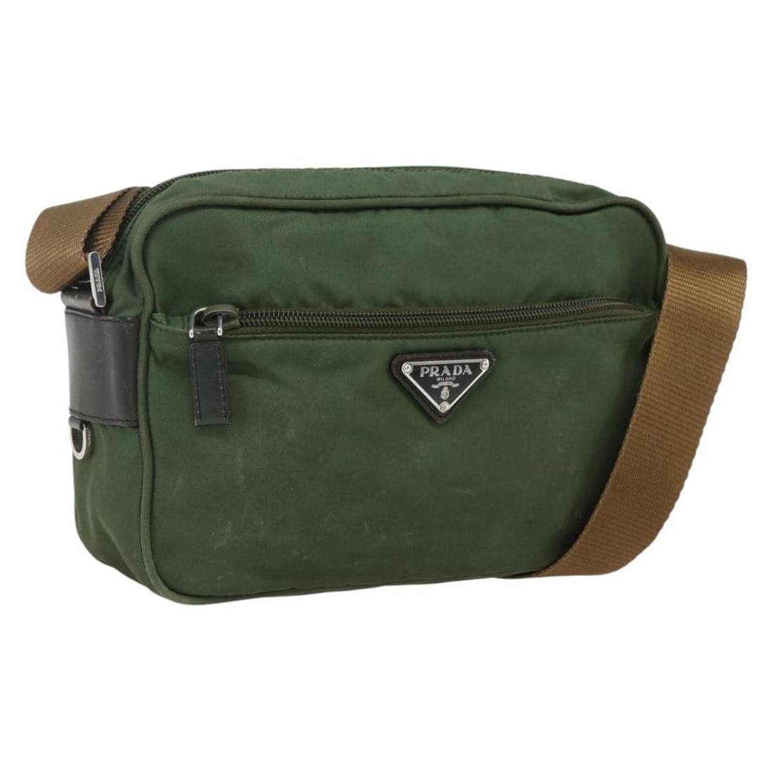 Prada Green Nylon Shoulder Purse with Silver Details Italy: Prada Green Nylon Shoulder Purse with Silver Details Italy This PRADA shoulder bag features a green nylon exterior accented with silver-tone details. Designed for women, it offers a practical and styl