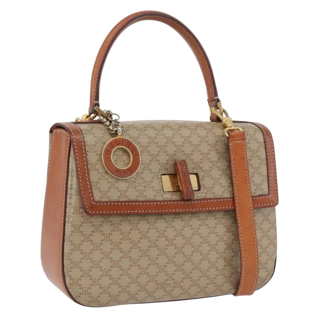 Celine Beige Macadam PVC Handbag with Shoulder Strap and Gold Accents: Celine Beige Macadam PVC Handbag with Shoulder Strap and Gold Accents This is a Celine Macadam Canvas Circle 2-way handbag crafted from beige and gold PVC leather and Macadam canvas. Designed for wome