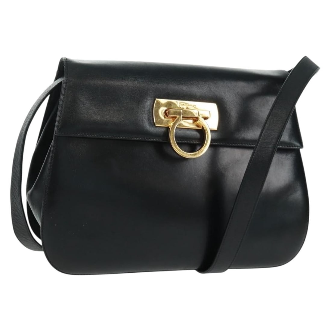 Black Leather Gancini Shoulder Bag by Salvatore Ferragamo Gold Accents: Black Leather Gancini Shoulder Bag by Salvatore Ferragamo Gold Accents This Salvatore Ferragamo Gancini shoulder bag features black leather with gold-tone accents. Designed as a compact and stylish ac