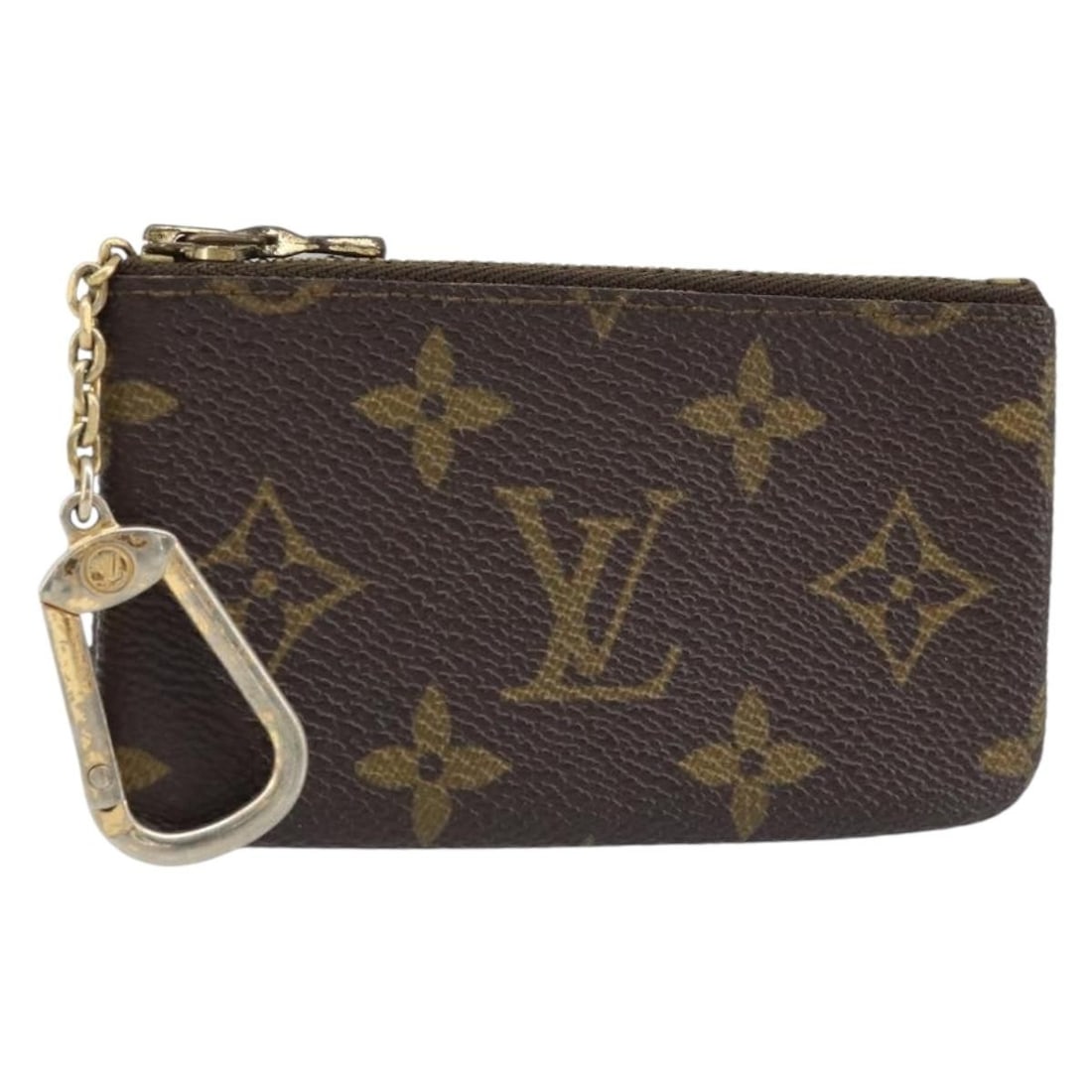 Monogram Canvas Coin Purse M62650 by Louis Vuitton: Monogram Canvas Coin Purse M62650 by Louis Vuitton This Louis Vuitton Monogram Pochette Cles coin purse features the brand's iconic monogram canvas in a compact and practical design. The purse is made