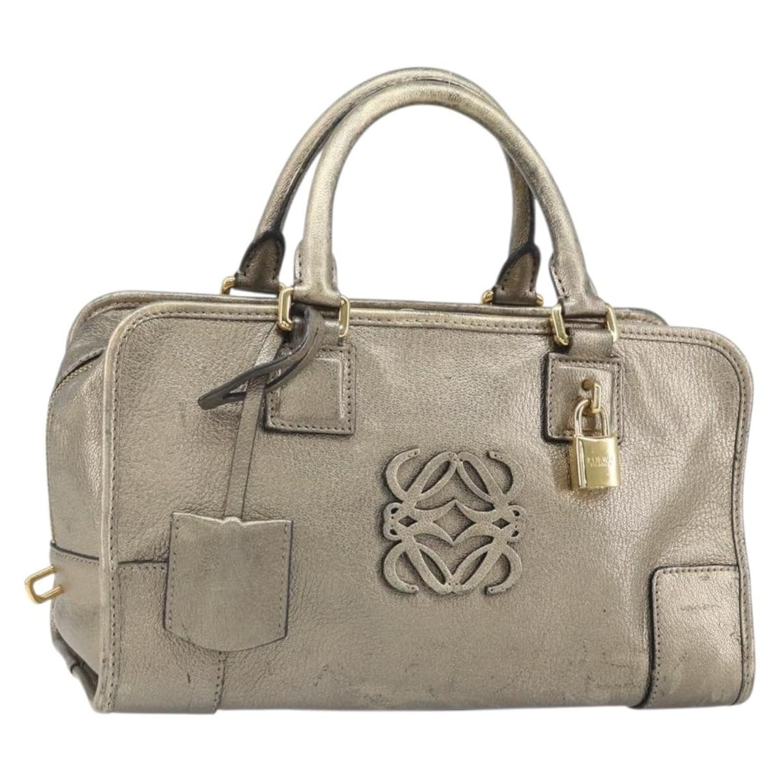 LOEWE Amazonas leather handbag with padlock keys and clochette: LOEWE Amazonas leather handbag with padlock keys and clochette Loewe Amazonas handbag in leather with a gold tone exterior. This women's handbag is made in Spain and includes a padlock, two keys, and 