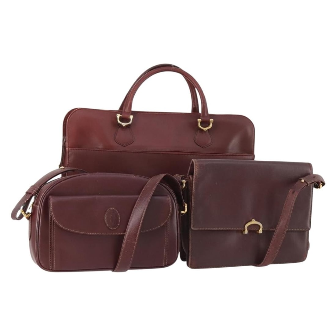 Cartier Must Line leather shoulder bag 3-piece set Bordeaux gold tone: Cartier Must Line leather shoulder bag 3-piece set Bordeaux gold tone Cartier Must Line shoulder bag in leather with a Bordeaux and gold color scheme. This special set sale includes the dust bag and g