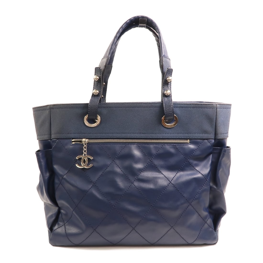 CHANEL Paris Biarritz Blue PVC Coated Canvas Tote Bag: CHANEL Paris Biarritz Blue PVC Coated Canvas Tote Bag CHANEL Paris Biarritz tote bag in blue PVC coated canvas, designed for women and made in France. The bag features a coated canvas exterior, blue f