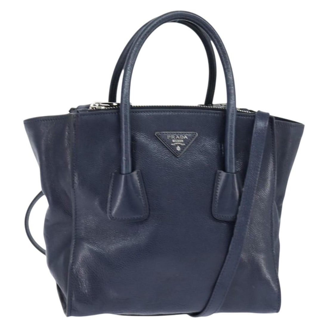 PRADA Navy Gold Leather Hand Bag 2way Auth BA7315: PRADA Navy Gold Leather Hand Bag 2way Auth BA7315 This elegant PRADA hand bag is crafted from high-quality leather and features a striking navy and gold color scheme, making it a stylish addition to a