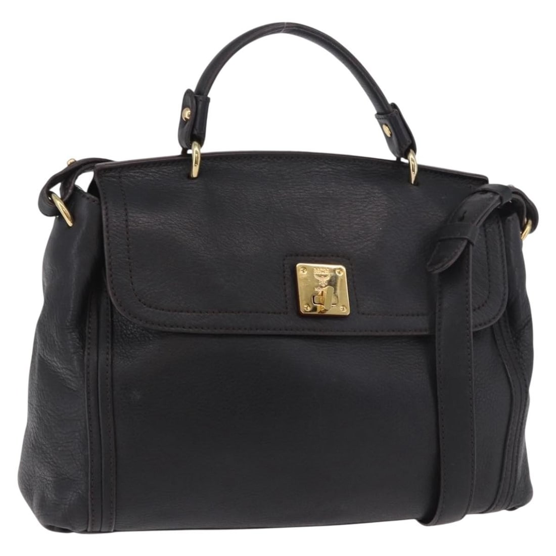 MCM black leather 2-way handbag with shoulder strap: MCM black leather 2-way handbag with shoulder strap MCM 2-way handbag in black leather with gold-tone accents. This women's bag includes a shoulder strap and can be carried by the handles or worn over