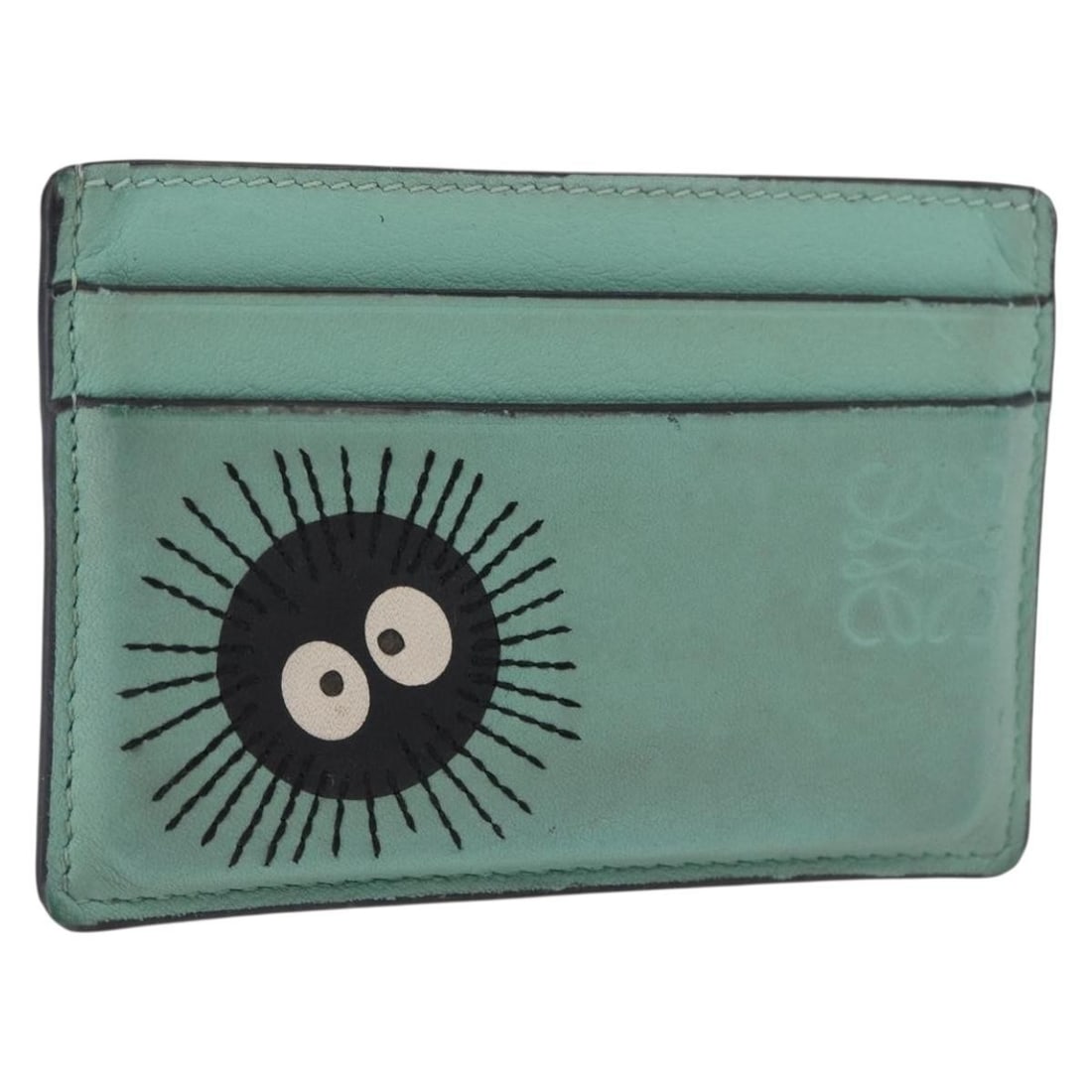 LOEWE Studio Ghibli Susuwatari green leather card case: LOEWE Studio Ghibli Susuwatari green leather card case This LOEWE x Studio Ghibli Susuwatari Spirited Away card case is crafted from green leather and features a compact design. Made in Spain, it is d