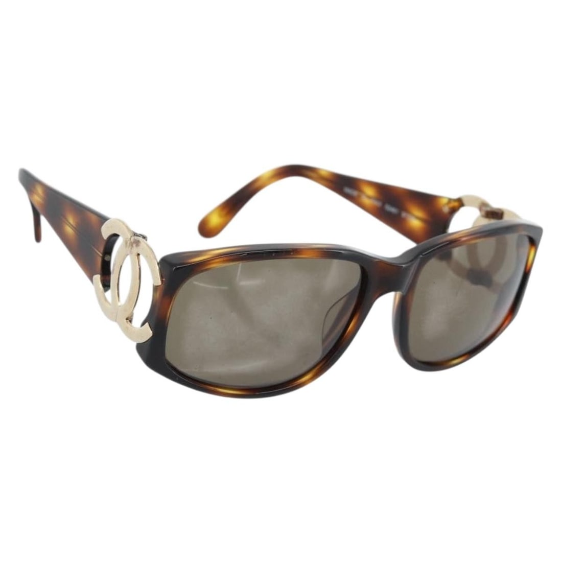 CHANEL CC Brown Gold Plastic Tortoise Sunglasses: CHANEL CC Brown Gold Plastic Tortoise Sunglasses CHANEL tortoise pattern sunglasses in brown and gold plastic, made in Italy. This women's pair has a heavily used condition with rubbing and scratches 