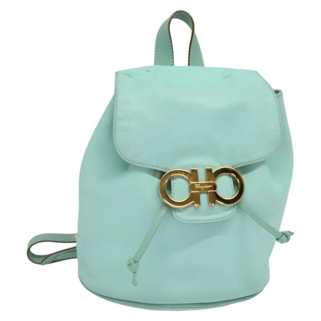 Salvatore Ferragamo Turquoise Blue Leather Backpack Gold Accents: Salvatore Ferragamo Turquoise Blue Leather Backpack Gold Accents This Salvatore Ferragamo backpack features a stylish blend of turquoise blue and gold leather, embodying elegance and functionality. Ma