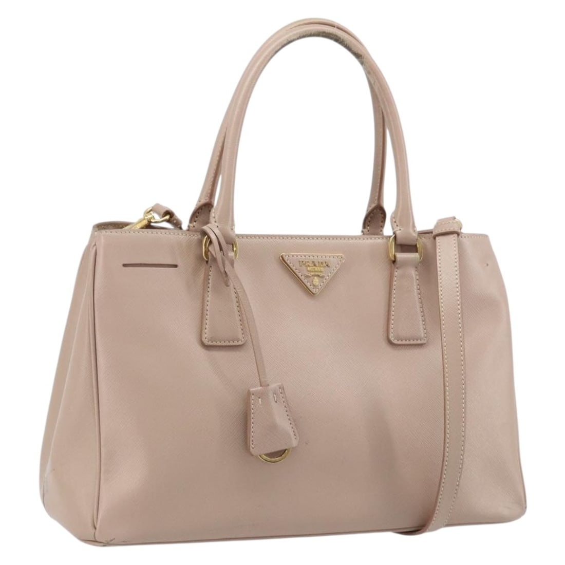 PRADA Galleria Saffiano Leather 2 Way Handbag Pink Gold: PRADA Galleria Saffiano Leather 2 Way Handbag Pink Gold Prada Galleria 2-way handbag in pink Saffiano leather with clochette and shoulder strap. Made in Italy, this women's handbag shows heavy use wit