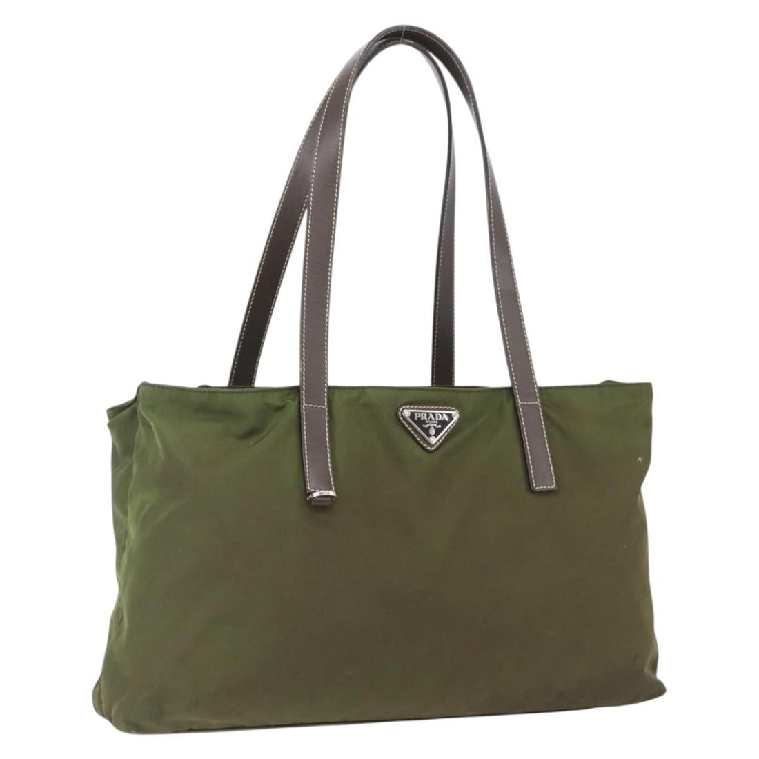 Prada Khaki Nylon Tote with Silver Tone Accents: Prada Khaki Nylon Tote with Silver Tone Accents This PRADA tote bag features a khaki nylon exterior with silver-tone accents. The bag is made in Italy and offers a spacious interior, making it suitabl