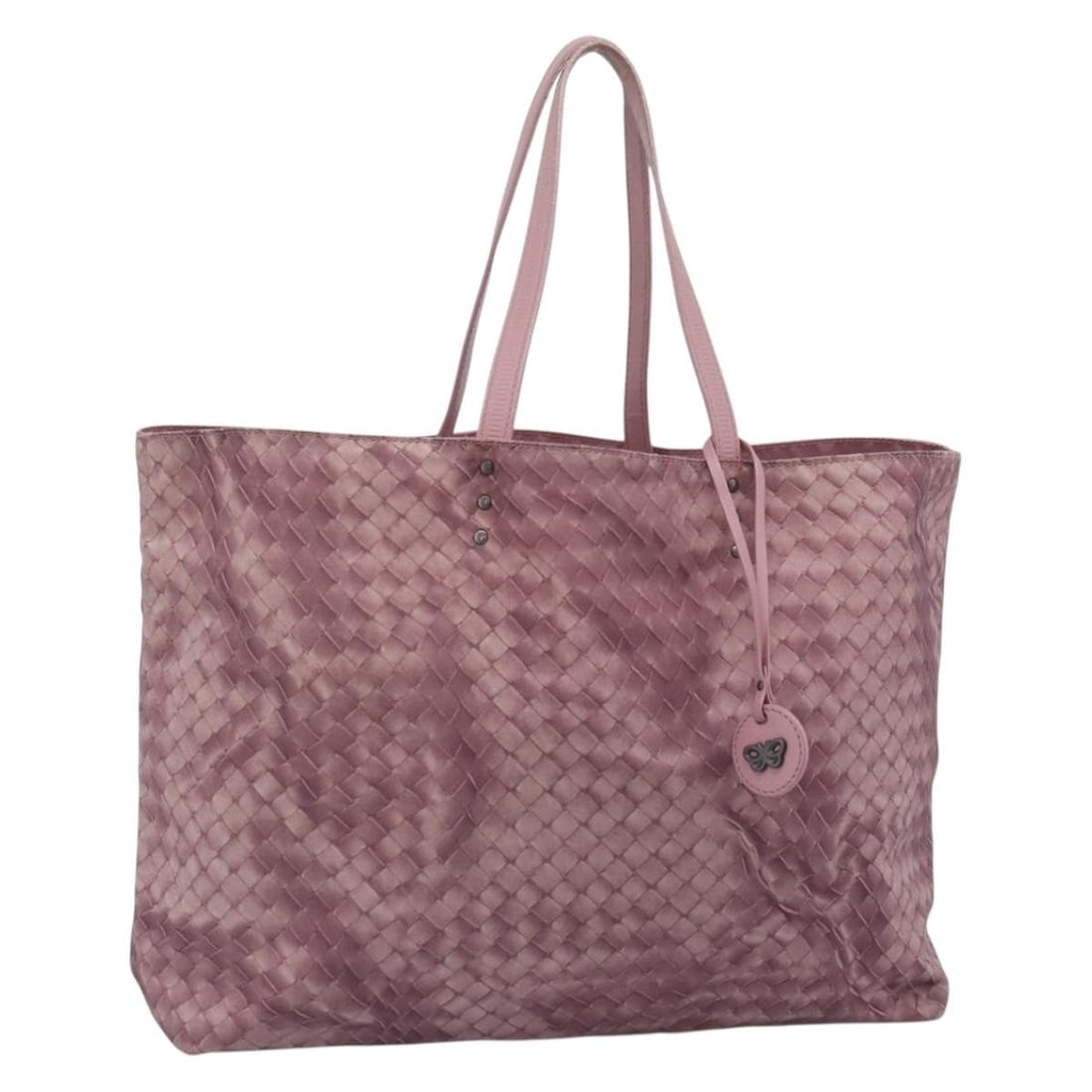 Bottega Veneta Intrecciato Pink Nylon Tote Bag with Charm: Bottega Veneta Intrecciato Pink Nylon Tote Bag with Charm Pink nylon tote bag with intrecciato detailing, made in Italy. It comes with a charm accessory and shows heavy use, including out-of-shape are