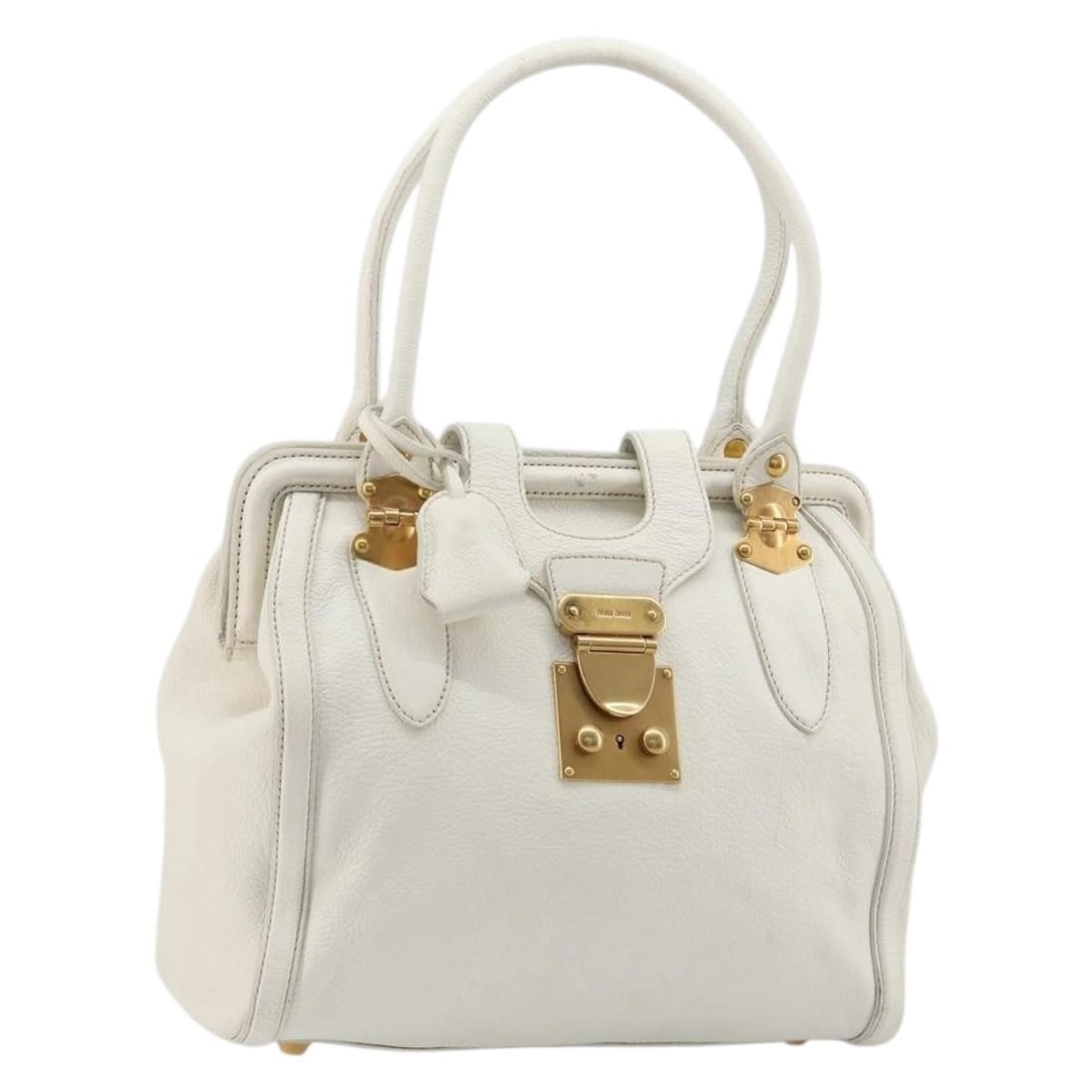 Miu Miu White Leather Handbag with Gold Tone Hardware Key Clochette: Miu Miu White Leather Handbag with Gold Tone Hardware Key Clochette White and gold leather hand bag by Miu Miu, made in Italy. It includes one key and a clochette. The bag shows significant signs of u