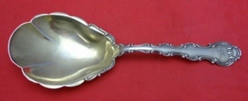 Gorham Strasbourg Sterling Silver Berry Spoon Gold Washed Applied Lacing 8 3/4": Gorham Strasbourg Sterling Silver Berry Spoon Gold Washed Applied Lacing 8 3/4" A Gorham Strasbourg sterling silver berry spoon with gold wash, scalloped detailing, and applied lacing. The spoon measu