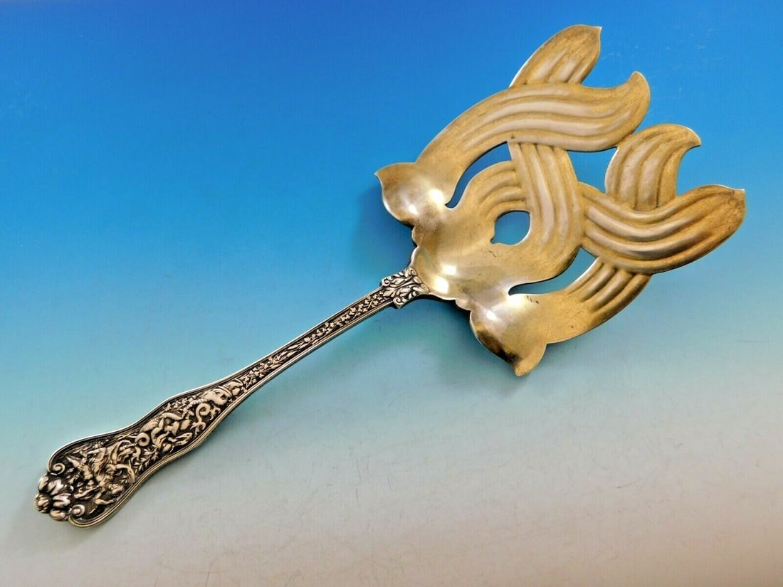 Rare Tiffany & Co Olympian Sterling Silver Asparagus Fork with Crossed Tines: Rare Tiffany & Co Olympian Sterling Silver Asparagus Fork with Crossed Tines This exquisite asparagus fork from the Olympian pattern by Tiffany & Co. exemplifies the finest craftsmanship in sterling s