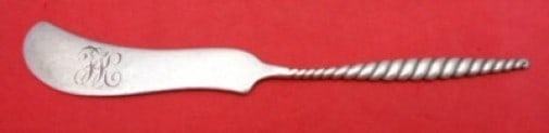 Whiting Oval Twist Sterling Silver Butter Spreader 5 1/4 Inches: Whiting Oval Twist Sterling Silver Butter Spreader 5 1/4 Inches This exquisite butter spreader features a flat handle design in the elegant Oval Twist pattern by Whiting. Made from high-quality sterli