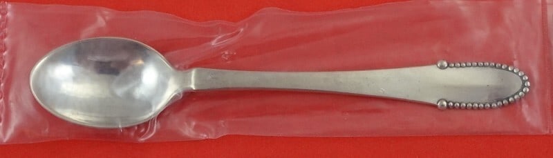 Georg Jensen Beaded Sterling Silver Coffee Spoon 4 5/8" New: Georg Jensen Beaded Sterling Silver Coffee Spoon 4 5/8" New This exquisite coffee spoon by Georg Jensen features the iconic Beaded pattern, crafted from high-quality sterling silver. Measuring 4 5/8 i