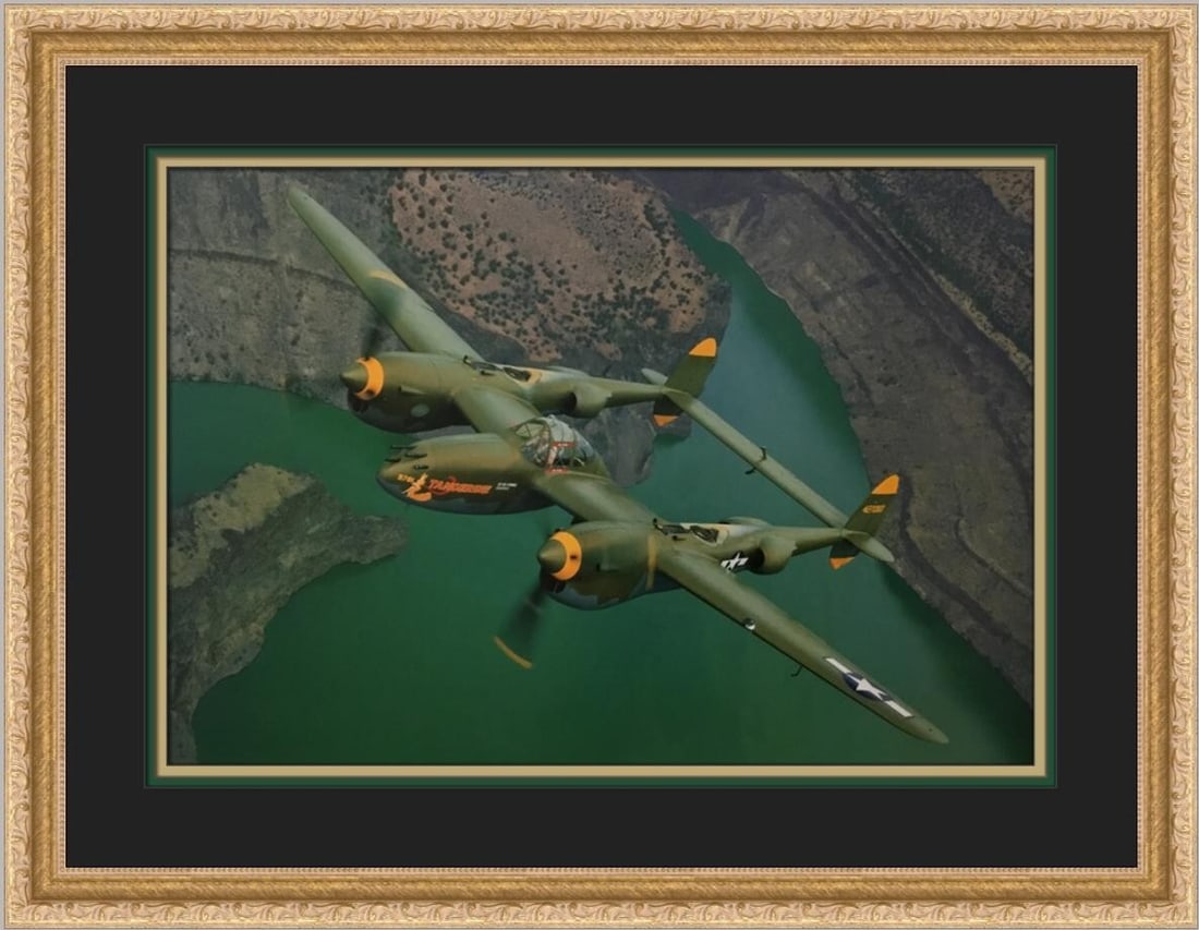 Lockheed P-38L Lightning Custom Framed Print by Philip Makanna: Lockheed P-38L Lightning Custom Framed Print by Philip Makanna This stunning custom framed print features the Lockheed P-38L Lightning, a remarkable representation of aviation art. Created by artist P