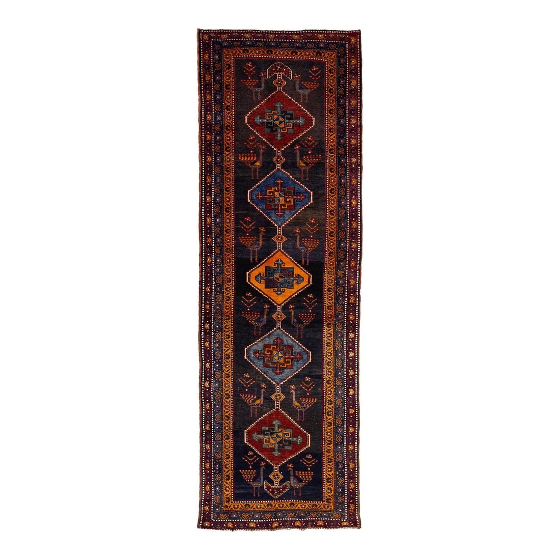 Persian Qashqai Wool Runner 4' x 12'4" Peacock Medallions: Persian Qashqai Wool Runner 4' x 12'4" Peacock Medallions Elevate your space with this vintage Persian Qashqai runner, expertly hand-knotted from 100% natural wool. Showcasing a dark indigo field ador